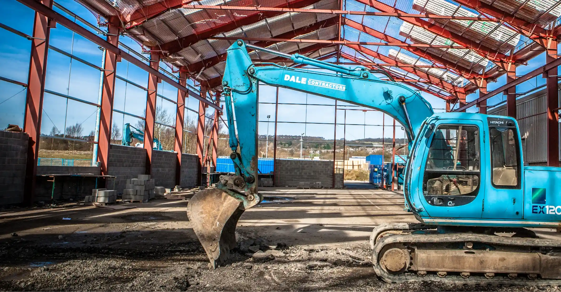 Dale Contractors digger and metal roof